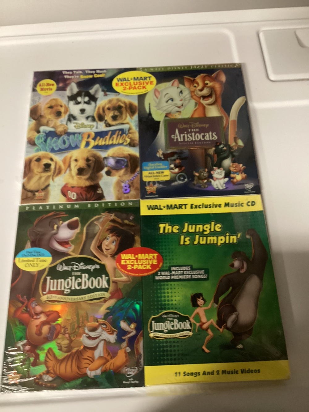 4 brand new Disney DVDs